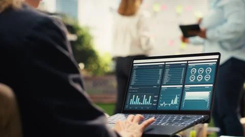 Close up of analytics dashboard shown on laptop screen outdoor Stock Photos