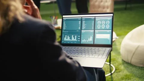 Close up of analytics dashboard shown on laptop screen outdoor Stock Photos