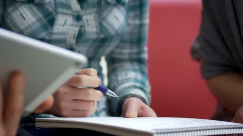 Close-up of analyzing research and transferring it to the scheme Stock Footage 75552909