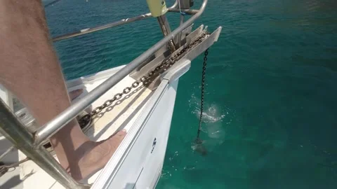 Close-up of anchor chain being lowered on a yacht. Stock Footage 260343789
