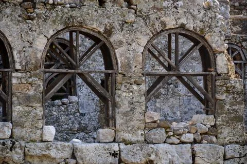 Close-up of Ancient Arched Windows in Olympos Ruins 写真素材