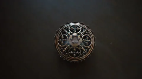 Close up on ancient coptic metal artwork. aromatic incense burning. top view Stock Footage 201297156