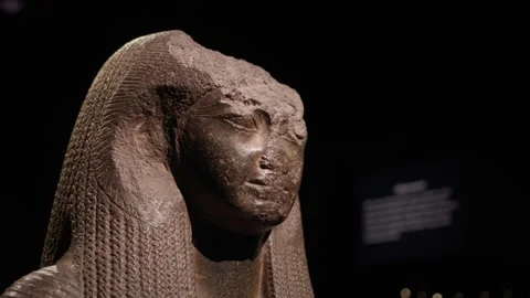 Close-up of an ancient Egyptian stone head statue depicting a pharaoh Stock Footage 333580978