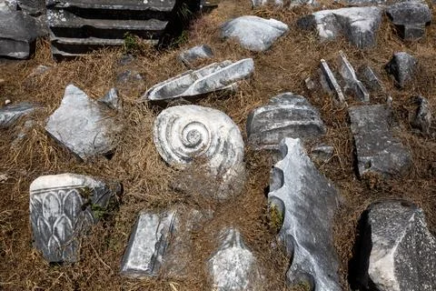 Close-up of Ancient Marble Carvings with Ionic Volute and Floral Motifs in .. Photos