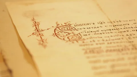 Close-up of ancient religious texts written in ancient Russian. Video stock 252751784