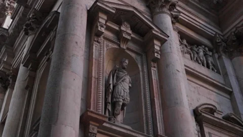 Close up of ancient statue on San Fedele church in Milan Stock Footage 141249618