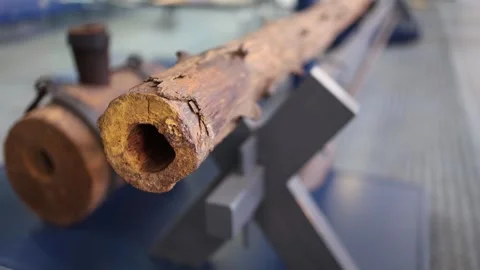 Close-up of an ancient wooden pipe used for water transport. This historical art Stock Footage 304884714