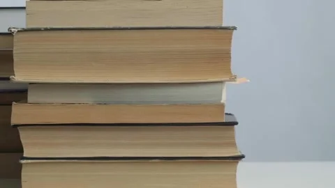 Close-up and macro shot many old books in school library or vintage bookshop Stock Footage 320247535