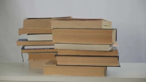 Close-up and macro shot many old books in school library or vintage bookshop Stock Footage 320248164