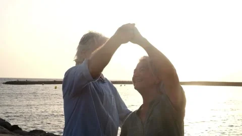 Close up and portrait of two happy and active seniors or pensioners having fun a Stock Footage 139047019