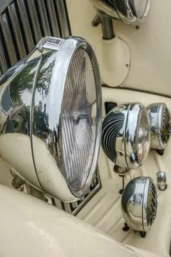 Close-up and selective focus of Bentley radiator grille and headlights Stock Photos