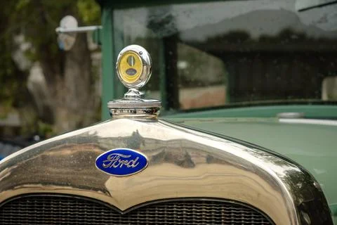 Close-up and selective focus of Boyce MotoMeter on Ford model A car hood Stock Photos