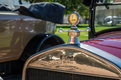 Close-up and selective focus of Boyce MotoMeter on Ford model A car hood Stock Photos