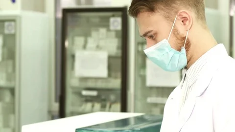 A close-up and smooth transition of the camera from the head to the hands of the Video stock 84863659