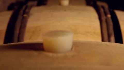 Close-up and soft focus on a Cork of a barrel in a cellar Stock Footage 74197542