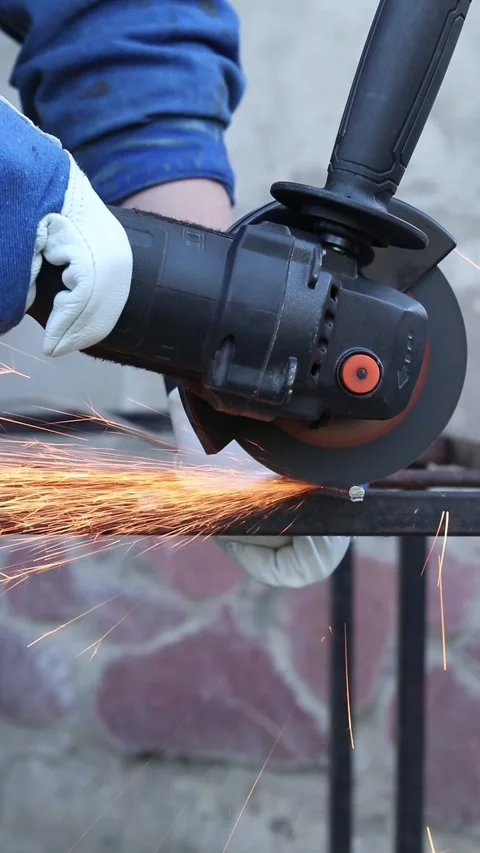 Close-up of an angle grinder cutting rebar Stock Footage 317023535