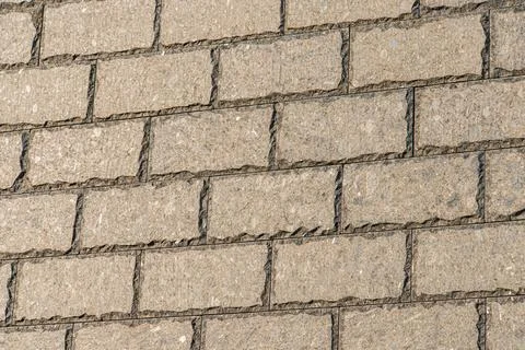 Close-up of an angled view of a weathered brick roof surface, with uniform,.. Stock Photos