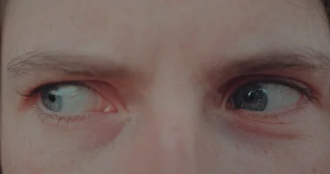 Close up of angry confused crazy looking eyes Video stock 152450110
