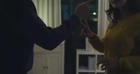 Close up angry Hispanic young couple arguing and pointing fingers in home. 스톡 동영상 344106640