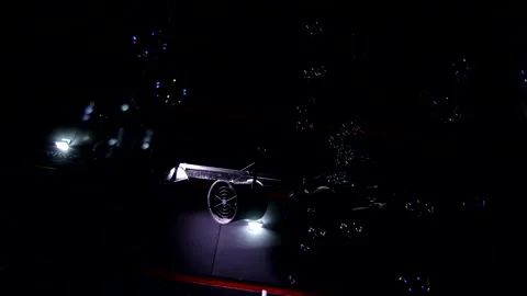 Close up animation autofocus shot of soap bubbles flying moving in air chaotical 動画素材 138774106