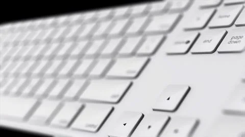 Close-up animation of white computer keyboard buttons. Rotate white keyboard in Stock Illustration
