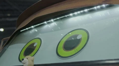 Close-up of anime eyes windshield sticker and LED strip Stock Footage 340763319