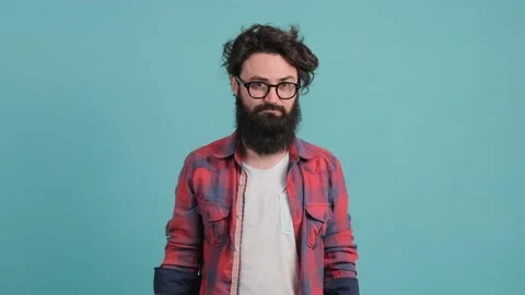 Close up of an annoyed man making face palm gesture, feeling bored. Stock Footage 142514567