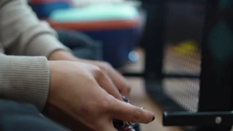 Close up of an anonymous woman hands assembling and installing wheels onto .. Stock-Footage 330281980