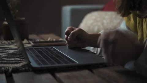 Close-up of an anonymous woman’s hands typing angrily on a laptop keyboard. Frus Stock Footage 346323536