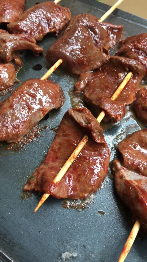 Close-up antichuchos on the grill Stock Footage 286168829