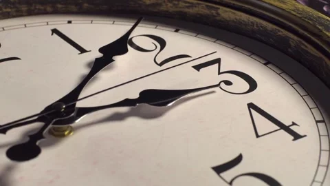 Close up of antique clock face showing time passing with moving hands over .. Stock Footage 337702631