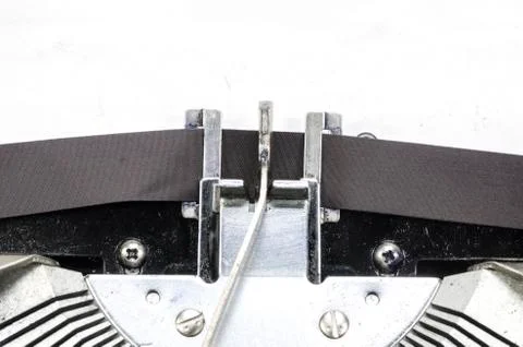 Close up of antique typewriter typebars with focus on the at symbol, great co Stock Photos