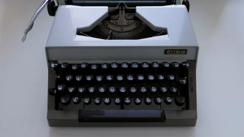 Close up of an antique typewriter on white background of the windowsill. Stock Stock-Footage 129549543