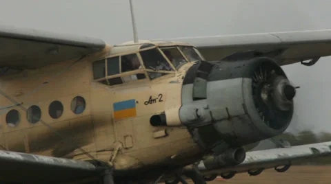 Close-up of Antonov An-2R going down the runway. Video stock 38394852