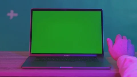 Close-up anxious young man typing on laptop keyboard greenscreen mock-up device Stock Footage 116171103