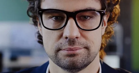 Close up of appealing caucasian man looking into the camera, smiling and taking Stock Footage 82445675