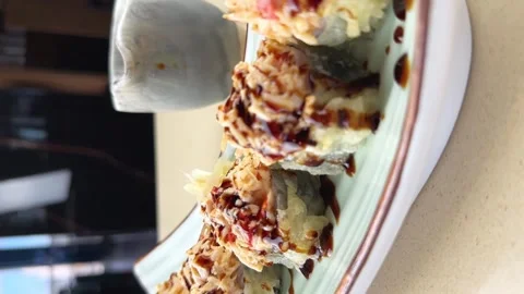 Close-up appetizing fresh set of rolls with sauce, cucumber, fish and rice Stock Footage 264964887