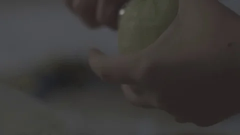 Close Up of Apple Being Scooped Super Slow Mo Видео 85067910