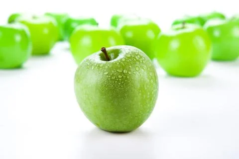 Close-up of an apple green on white 库存照片