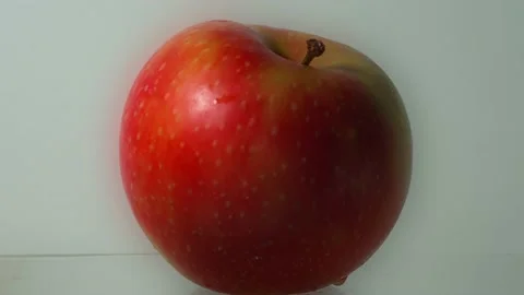 Close-up of a an apple on a white background Stock-Footage 164997897