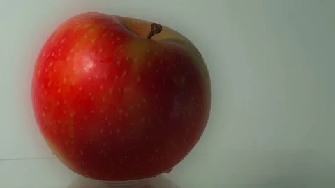 Close-up of an apple on a white background Stock-Footage 164997916