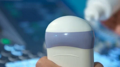 Close up of apply gel on ulstrasound probe. Video stock 76460460