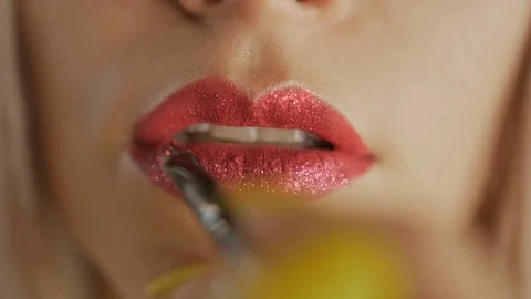 Close up of applying make up on lips Stock Footage 79712194