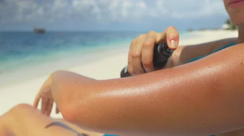 CLOSE UP: Applying sun screen Stock Footage 48430467