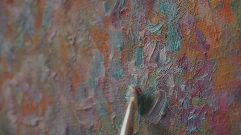 Close Up of Applying Thick Brushstrokes of Paint to Textured Canvas Surface 库存影片 330882127