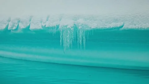 Close-Up Approach to the Edge of a Turquoise Glacier Ice Shelf Stock Footage 315094568