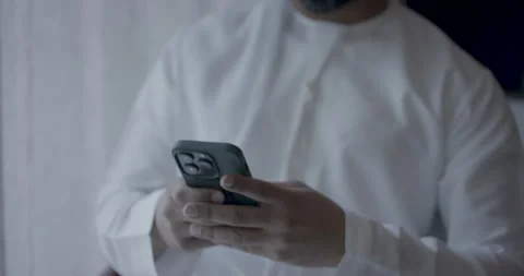 Close Up of arab man texting on his mobile. 스톡 동영상 247087085