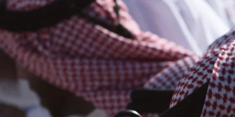 Close up of Arabic men performing traditional dance with sticks. Stock Footage 46871624