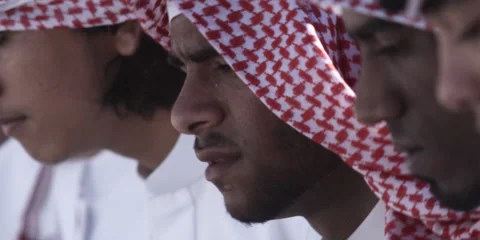 Close up of Arabic men performing traditional dance with sticks. Stock Footage 46871667