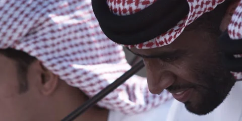 Close up of Arabic men performing traditional dance with sticks. Stock-Footage 46871698